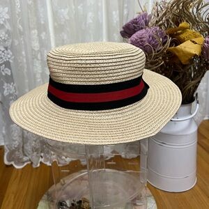 Elegant Cream Straw Hat with Red and Black Band
